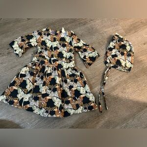 Kate Quinn Butterfly Print Dress with matching bonnet